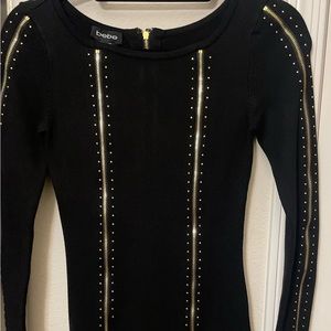 Bebe Black Long Sleeved Zipper Mini Sweater Dress Sz XS Fitted Gold Accent